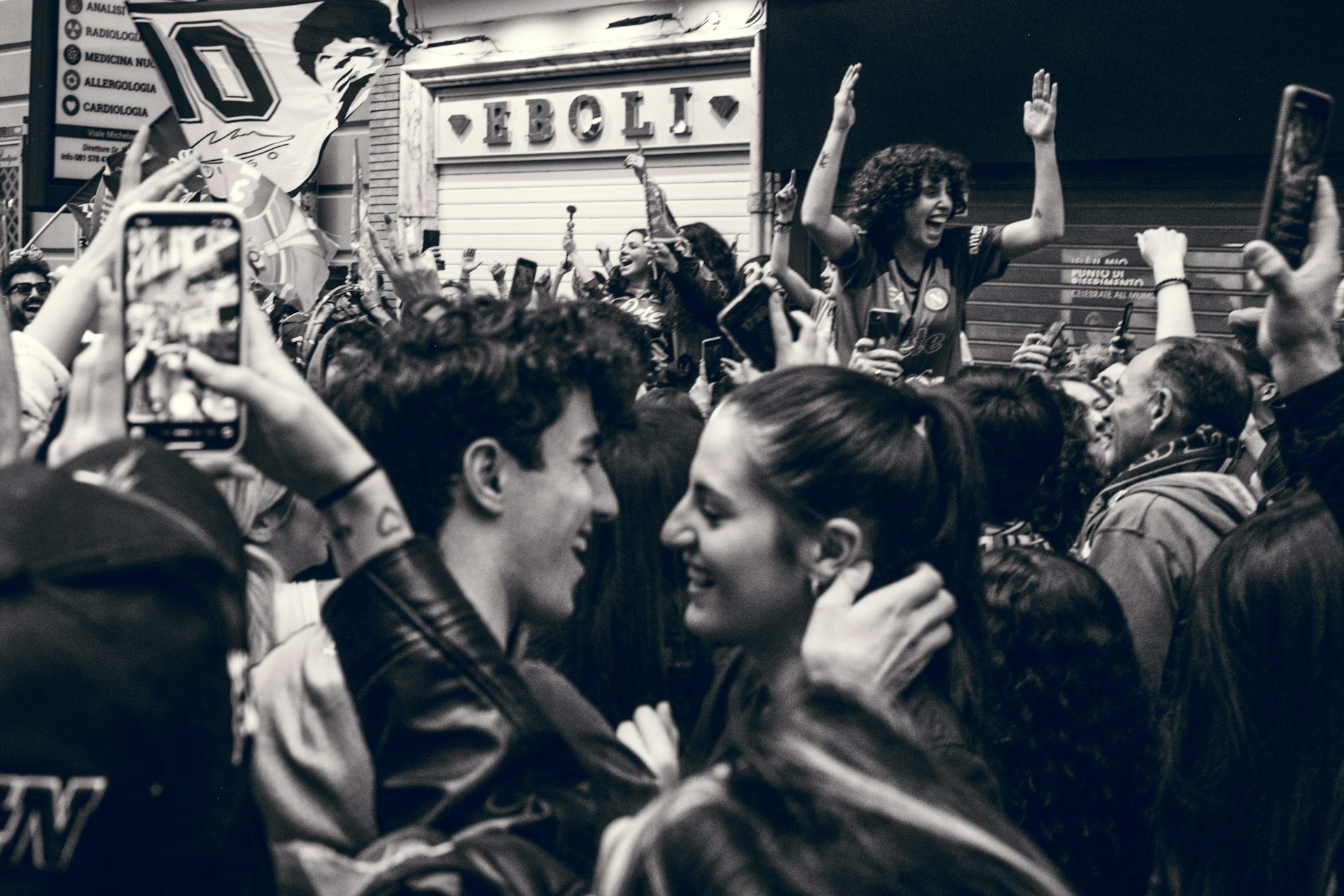 Gen Z couple in a crowd