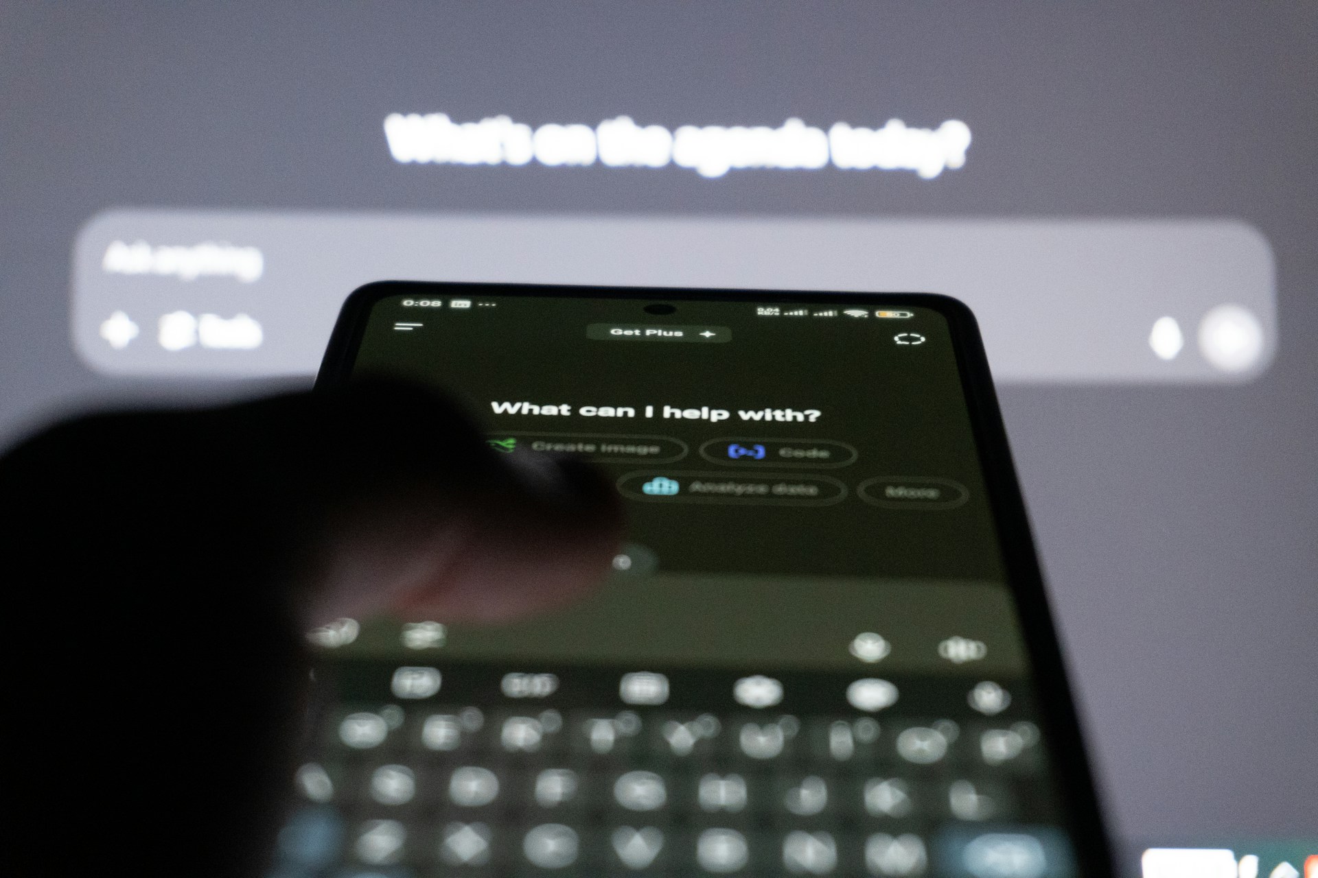 person typing on smartphone keyboard